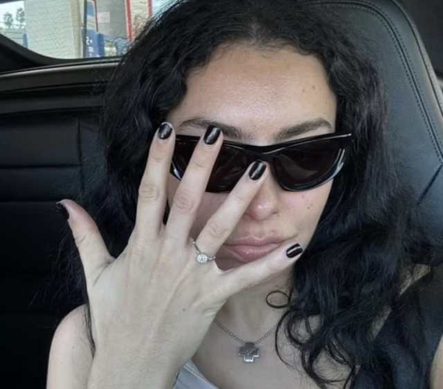 Charli XCX wearing engagement ring